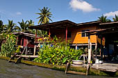 Scenery along the canal leading to Damnoen Saduak Floating Market. 